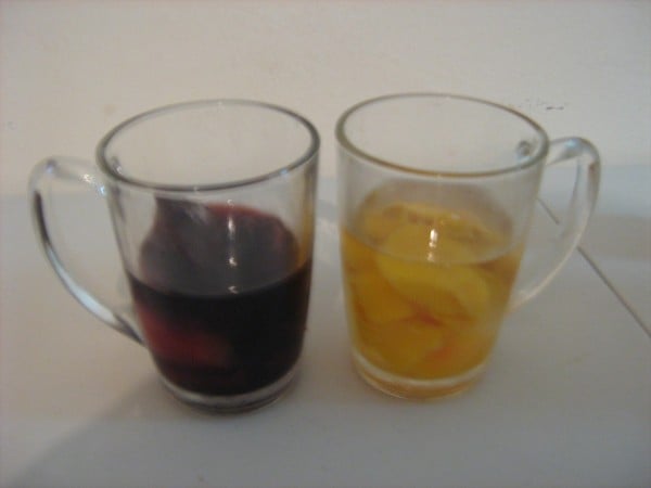 Wine with peaches in glasses